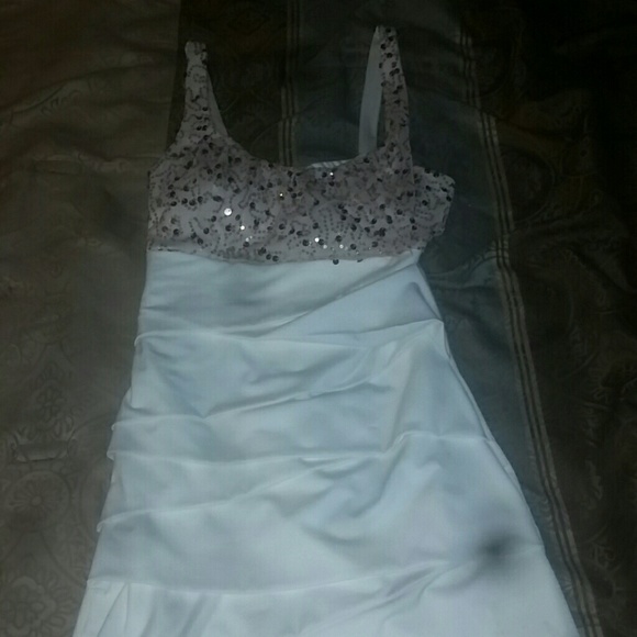 Rose hold with white short dress