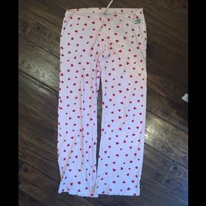 Pink with red hearts pajama pants.
