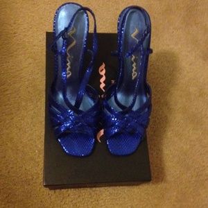 Snake skin pattern blue Nina sandals.
