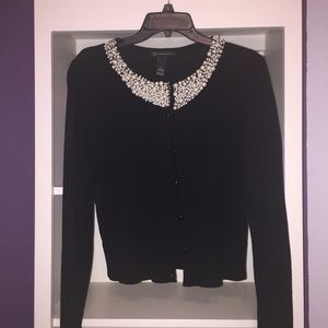 Pearl neck cardigan XL but runs small.