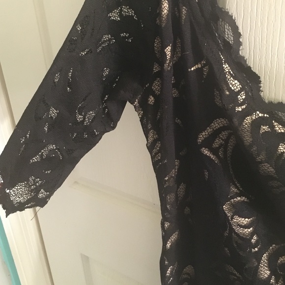 Beautiful laced black dress. Worn once to wedding - Picture 2 of 3