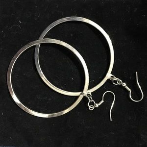 Silver tone large hoop earrings