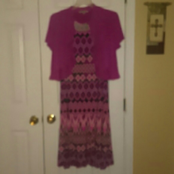 Silky sleevless dress with ruffled matching jacket