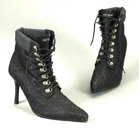 Black lace-up heeled boots