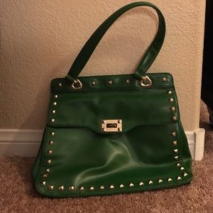 Green handbag with gold studs