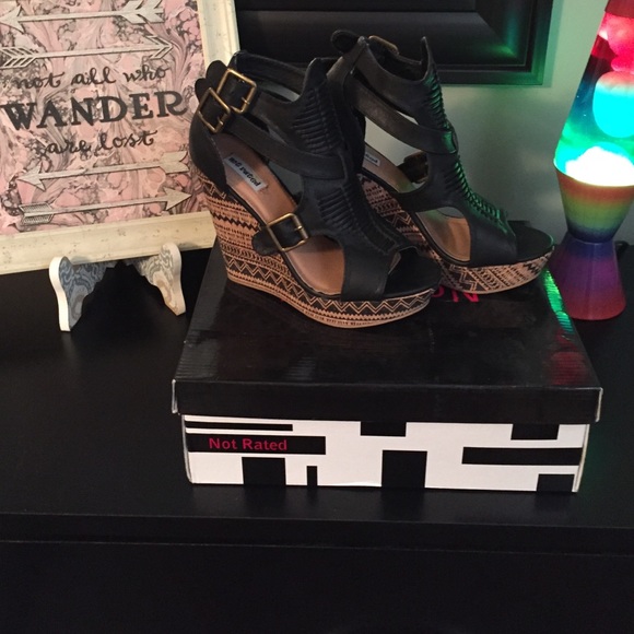 Not rated Aztec design wedges.