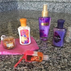 Various lotions, perfume, candle.