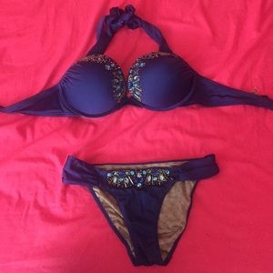 Royal blue halter bikini with jeweled detailing.