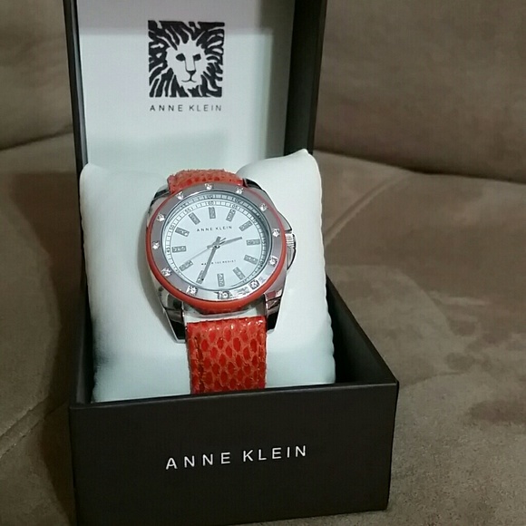 Anne Klein Accessories - Anne Klein orange snakeskin watch.Needs battery!