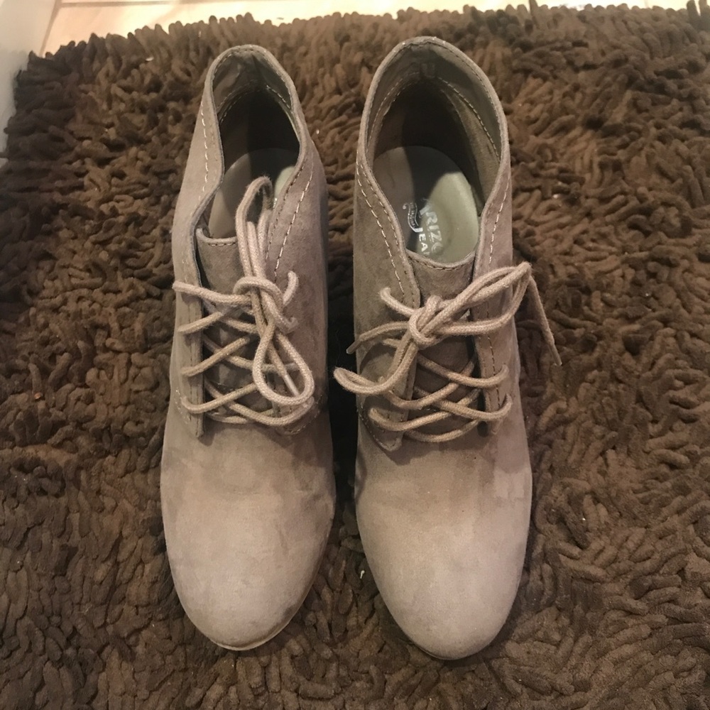 Gray lace-up bootie.