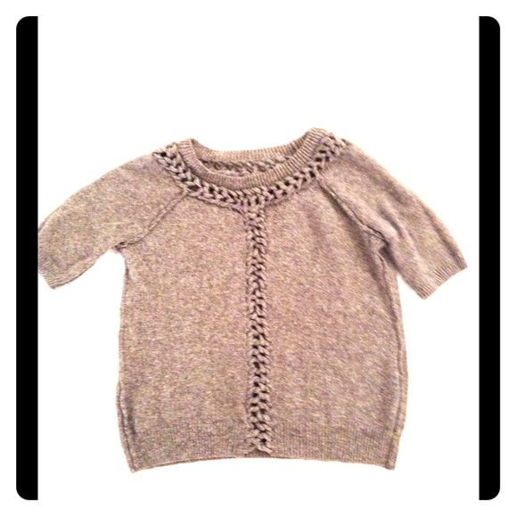 Brown sweater.