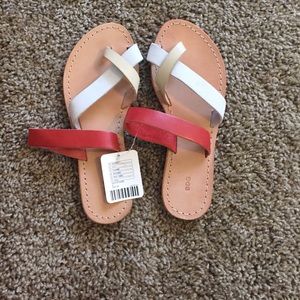 Red, white, and tan sandals from Urban Outfitters