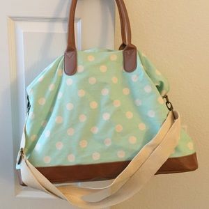 Blue and white polka dot duffle bag