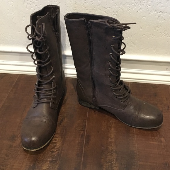 Leather combat boots, worn once.