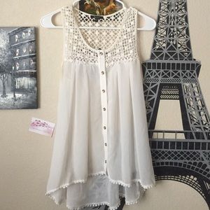 Sleeveless high low top