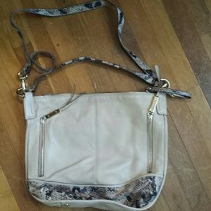 Tan and snake skin pattern purse