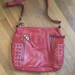 Red leather and seude purse with studs