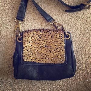 Mini studded leather bag