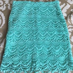 Cute teal green skirt with embroidered overlay