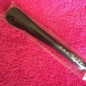 Makeup brush and eyeliner