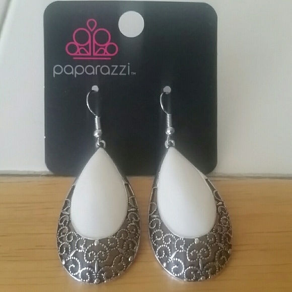 White earrings with detailed silver filigree