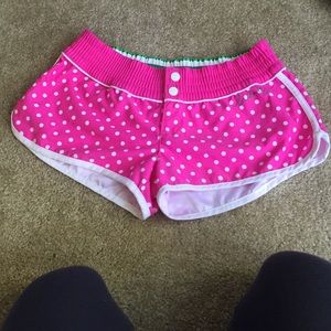 Pink polka dot board shorts