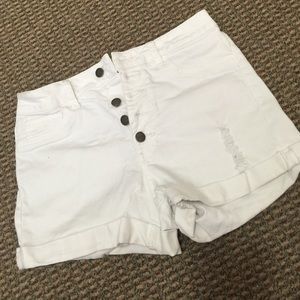 White, high waisted button up shorts, size M.