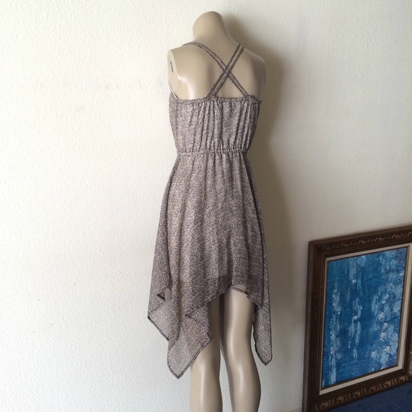 Charlotte Russe Dresses & Skirts - Mini Leopard Print Criss Cross Strappy Back Dress