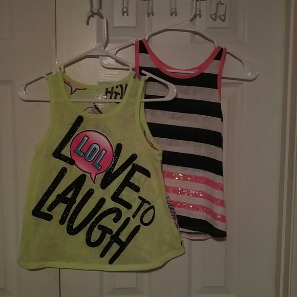 Justice tops size 14