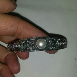 Sterling Silber bracelet with a pearl and purple s