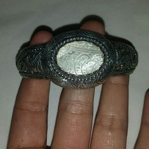 Sterling Silver bracelet with carved center