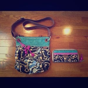 Fossil crossbody purse with matching wallet.