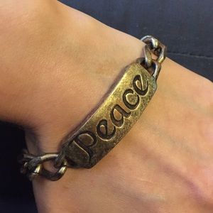 Gold Lucky Brand "Peace" chain bracelet