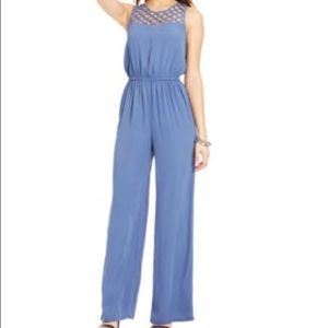 Never-worn lattice-laced periwinkle XOXO jumpsuit