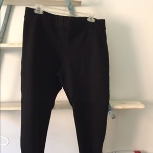 Black full length leggings, zippers on the ankles