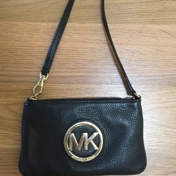 Micheal Kors wristlet on sale!