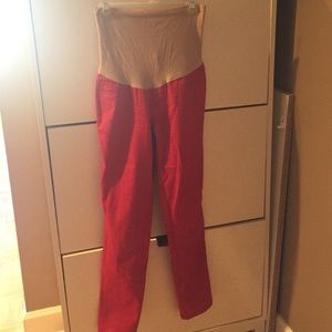 Red maternity skinny jeans