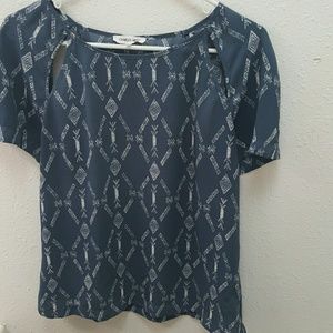 Abstract tribal shoulder keyhole top