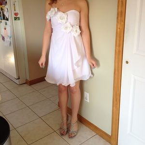 Strapless white chiffon dress with flower detail