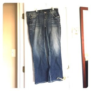 Torrid size12 boot cut jeans. embellished pockets.