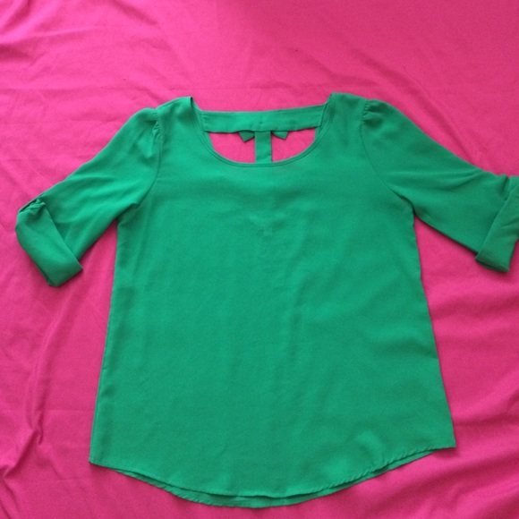 Charming Charlie 3/4 sleeve bow blouse.