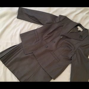 Woman's grey suit combo.
