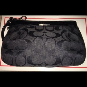 Black on black signature Coach wristlet