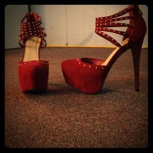 Maroon platform heels with gold embellishments