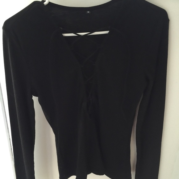 Lace up shirt.