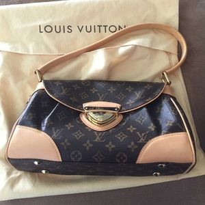 Louise Vuitton purse 100% genuine