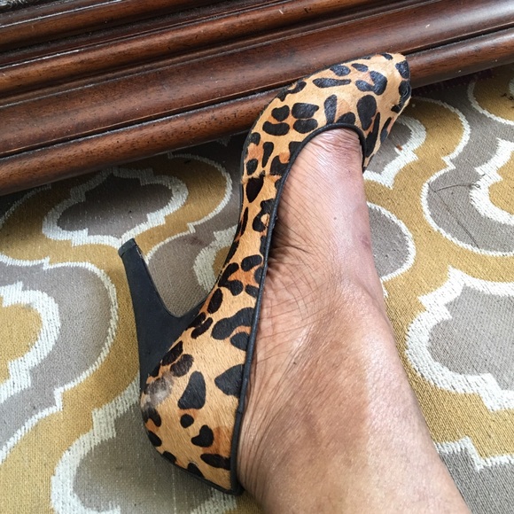 Leopard peep toe pump and beige bootie.