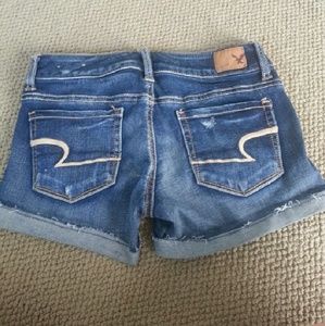Distressed super stretch AE shorts