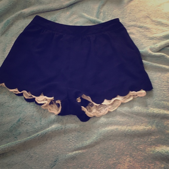 Slightly high waisted blue soft shorts white lace