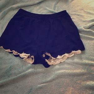 Slightly high waisted blue soft shorts white lace